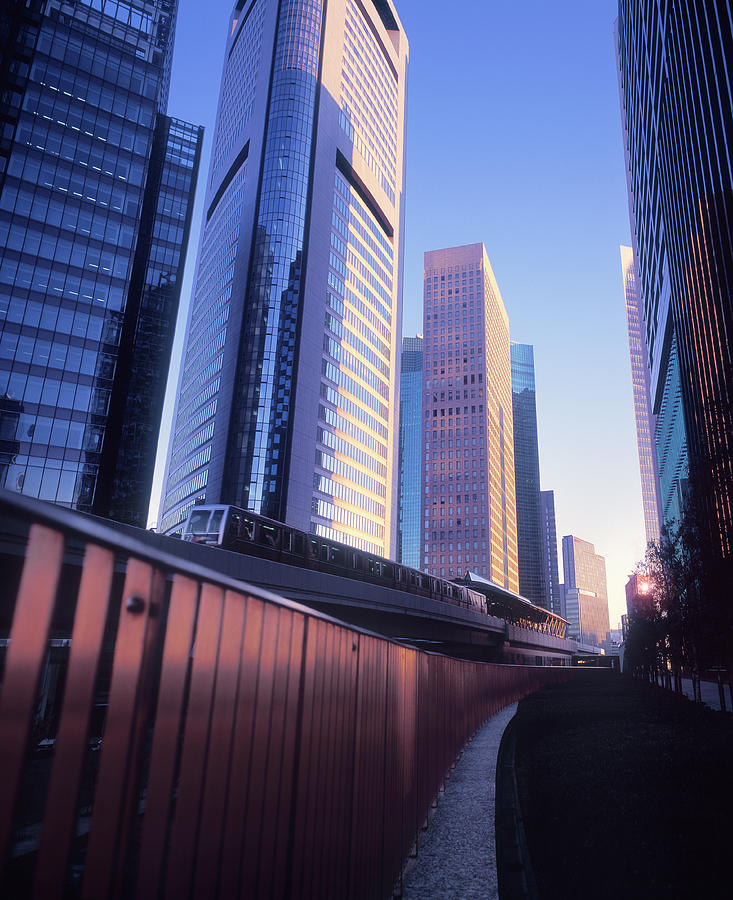 People Mover Entering A Tokyo Business Photograph by Eschcollection