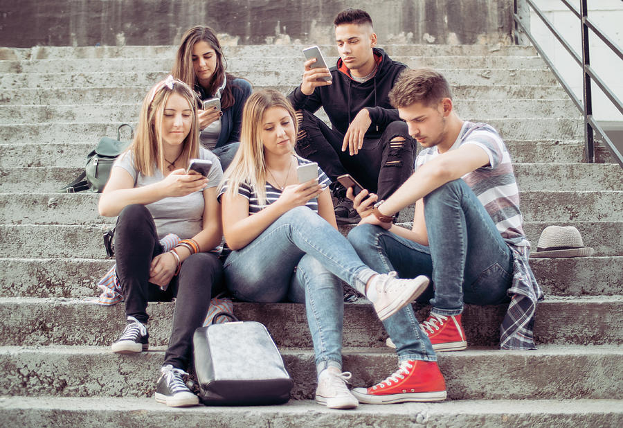 People Obsessed With Their Smartphones Photograph by Nemke
