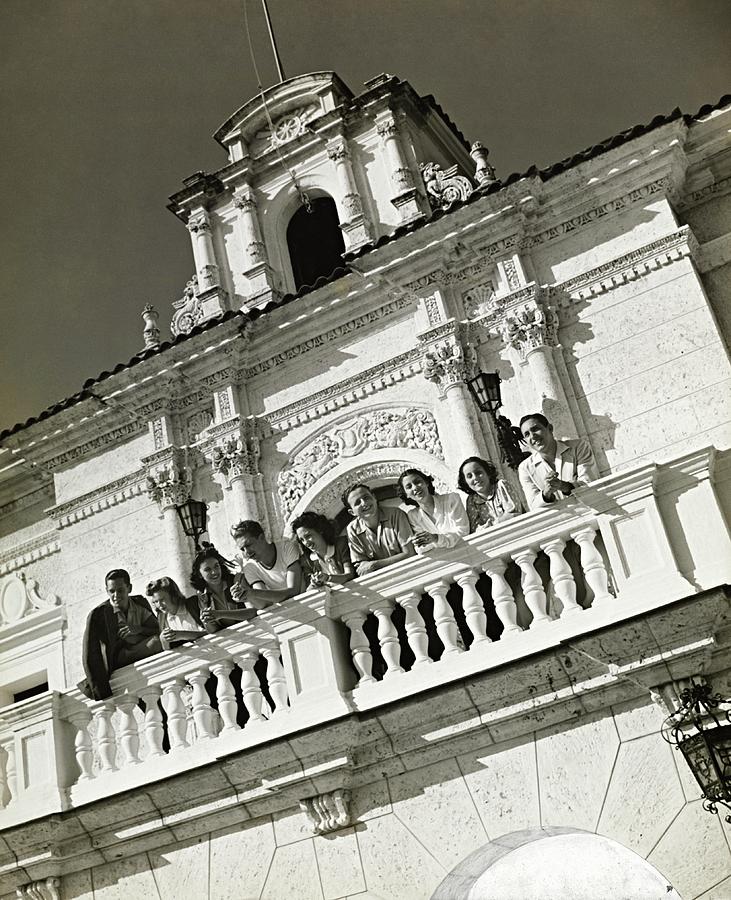 People On A Balcony Of The Jaimanitas-biltmore Photograph by Toni Frissell