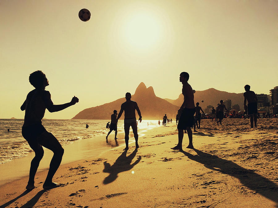 People Playing Football At Ipanema Photograph by Alexander Spatari