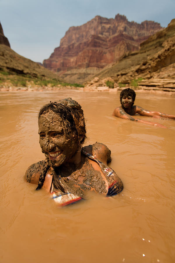 People Playingcovered In Mud Deep Photograph by Corey Rich