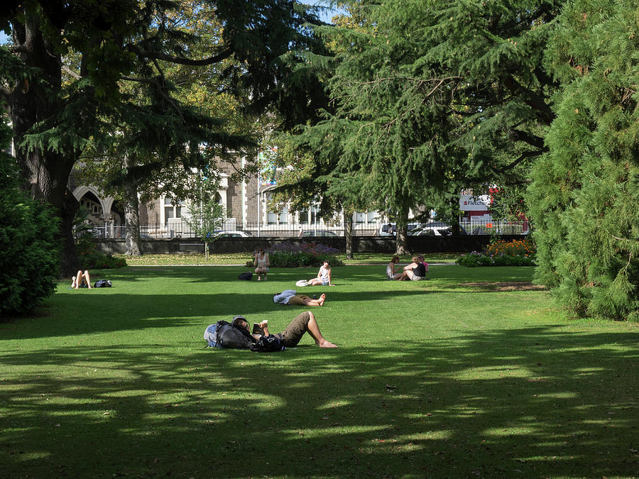 People Relaxing In Hagley Park Photograph by Panoramic Images