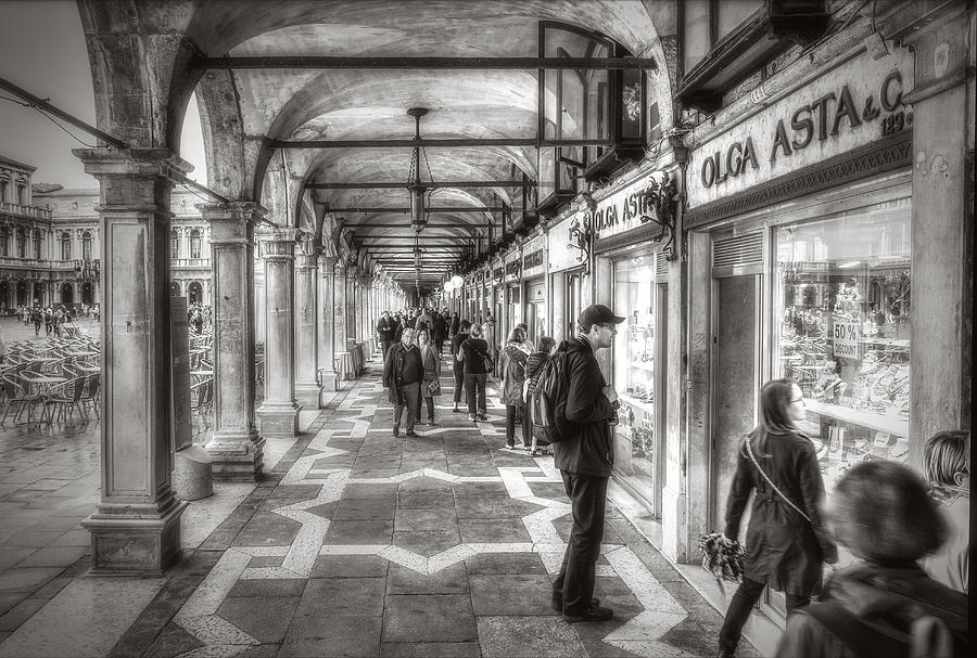 People under the arcades Photograph by Roberto Pagani