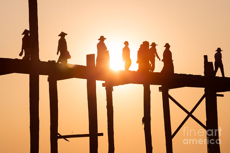 People walking on U Bein bridge at sunset - Mandalay - Myanmar Photograph by Matteo Colombo