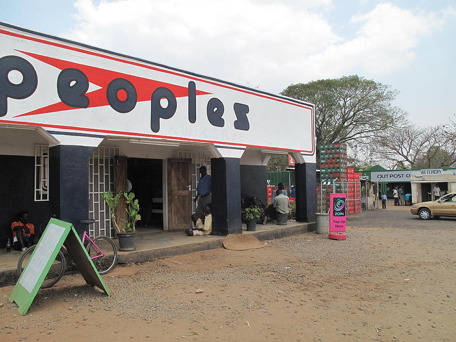 Shop Photograph - Peoples Store? by Frank Chipasula