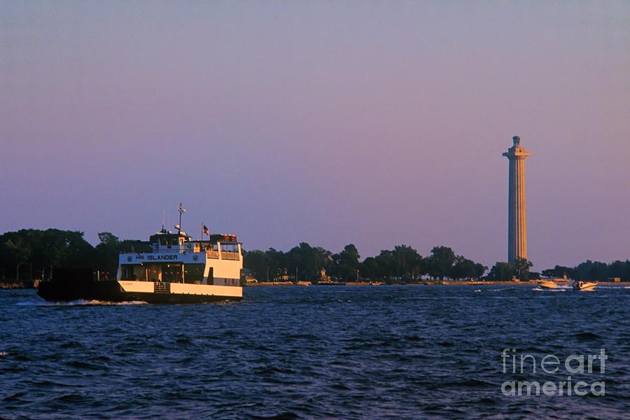 Perrys Monument and the Islander Ferry at Put-in-Bay Photograph by John Harmon