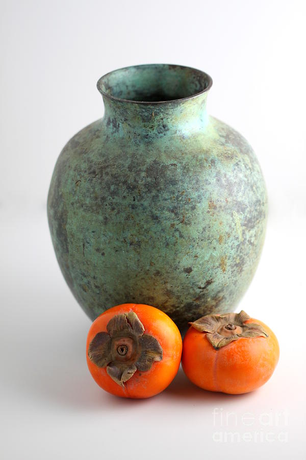 Persimmon with vase Photograph by Henrik Lehnerer