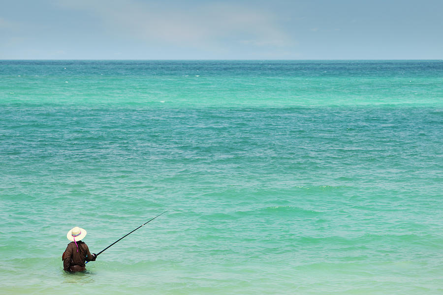 Nature Photograph - Person Fishing In Ocean Off Koh Pangan by Paul Taylor