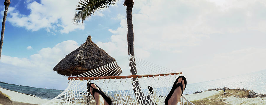 Person Resting In Hammock On The Beach Photograph by Panoramic Images ...