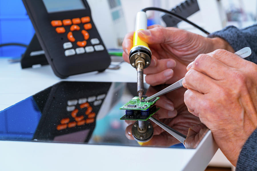 Male Photograph - Person Soldering An Electronic Component by Wladimir Bulgar/science Photo Library Male Photograph - Person Soldering An Electronic Component by Wladimir Bulgar/science Photo Library
