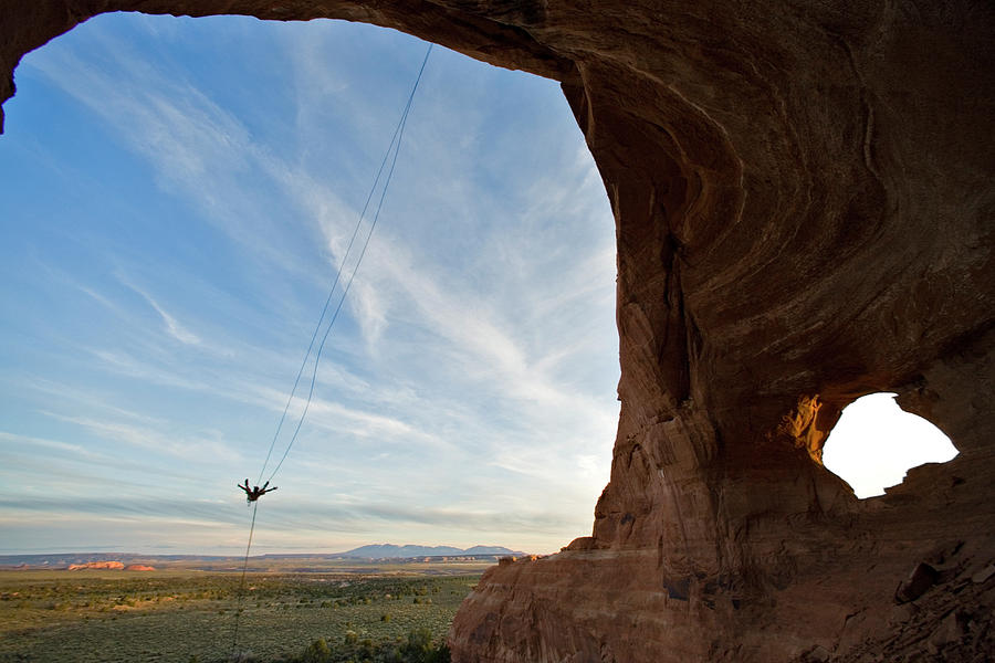 Daredevil Photograph - Person Swinging On A Rope Swing by Whit Richardson
