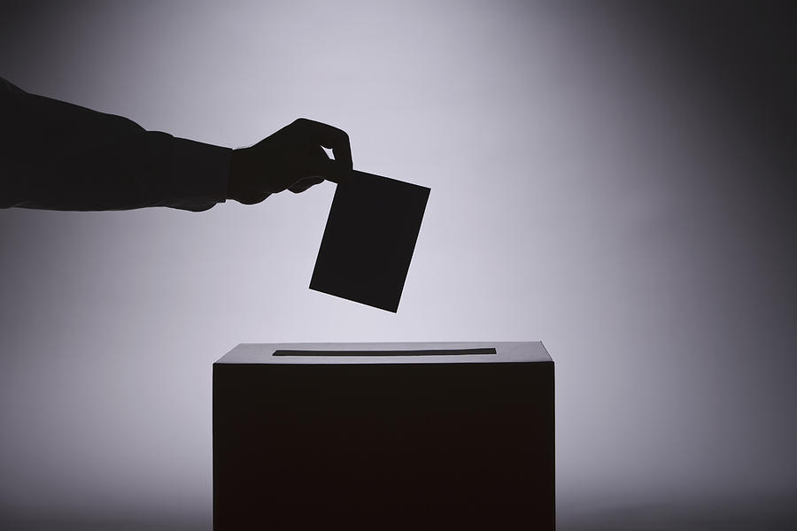Person voting Photograph by Comstock Images
