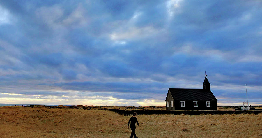 Architecture Photograph - Person Walking Toward Church, Iceland by Johnathan Ampersand Esper
