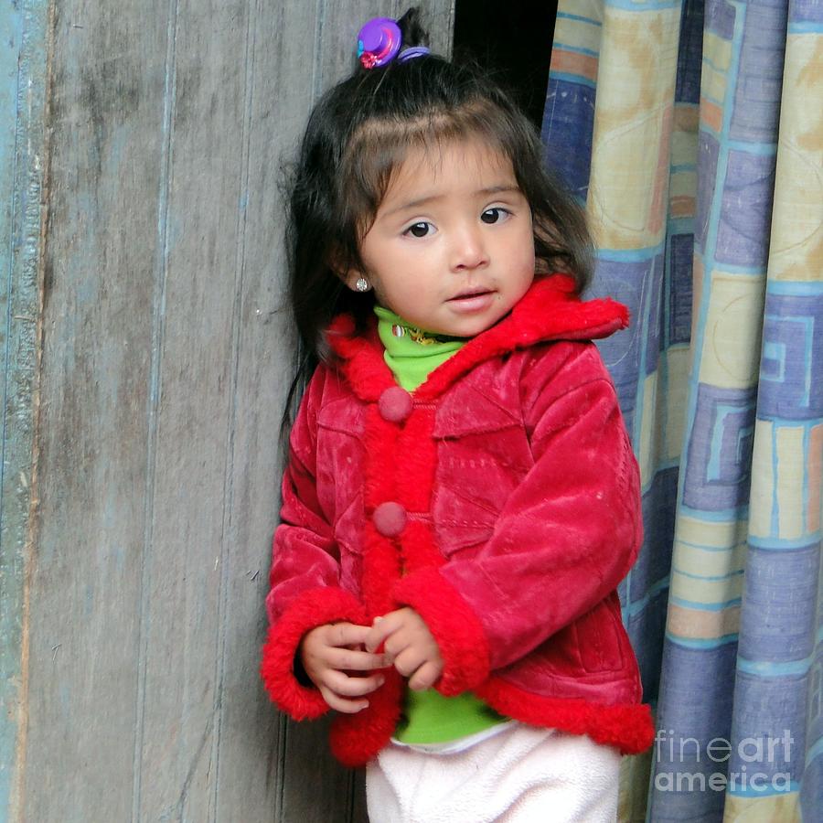 Peruvian girl in doorway Photograph by Barbie Corbett-Newmin