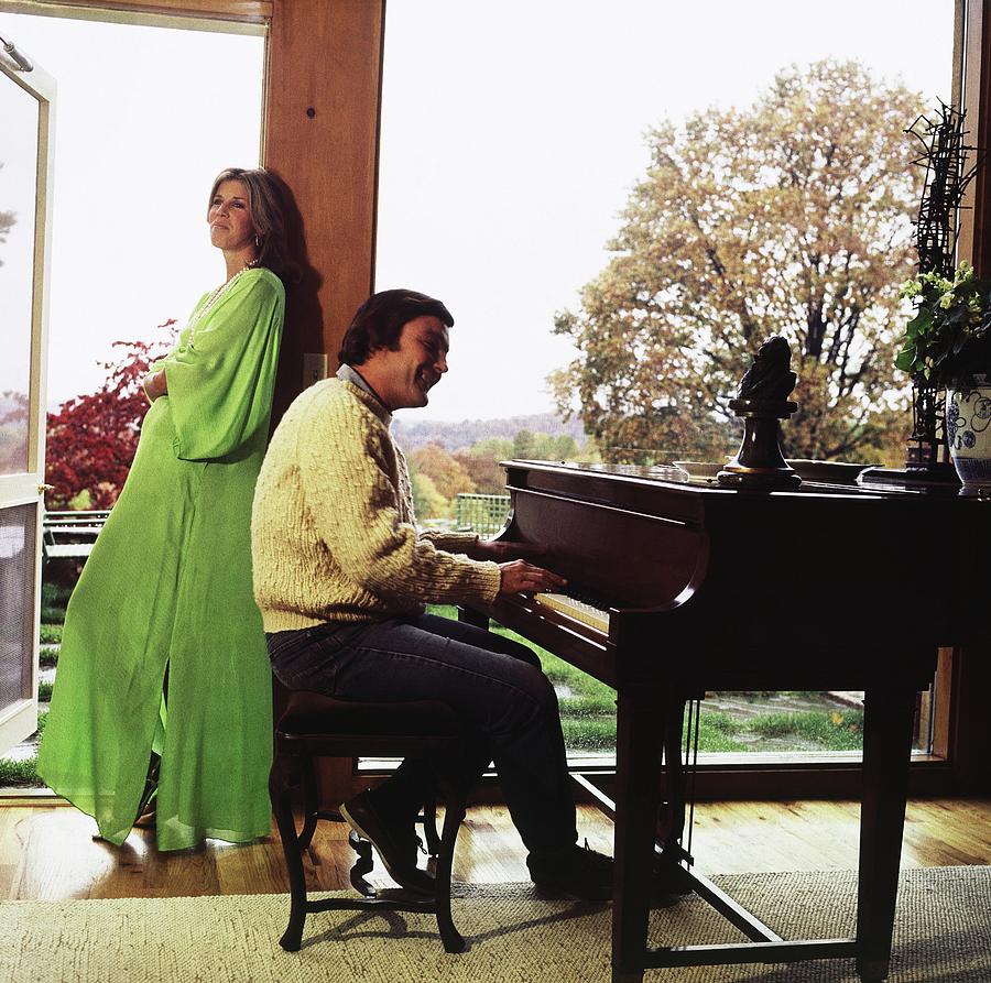 Peter And Cheray Duchin With A Piano Photograph by Horst P. Horst