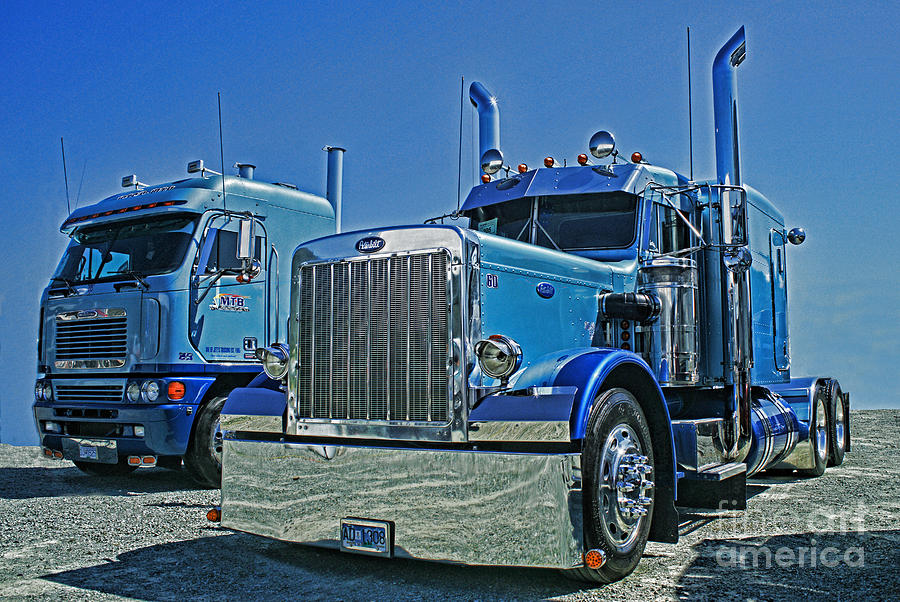 Peterbilt and Frieghtliner Photograph by Randy Harris