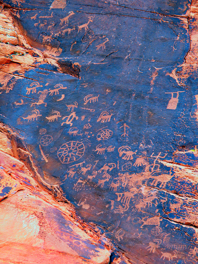 Petroglyphs in the Valley Of Fire Nevada. Photograph by Frank Wilson