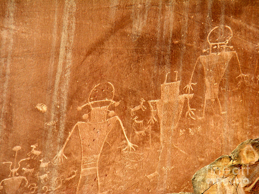 Petroglyphs or Space Men? Photograph by Eva Kato - Fine Art America