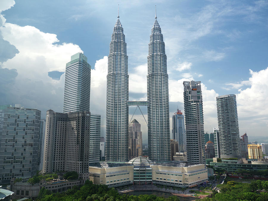Petronas Twin Towers And Kuala Lumpur Photograph by Travelpix Ltd