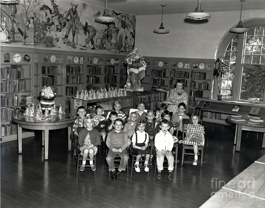 Pacific Grove Photograph - Pacific Grove library with Nina Post. circa 1955 by Monterey County Historical Society