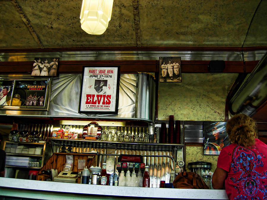 Elvis Presley Photograph - Elvis in the diner by Joel Zimmerman
