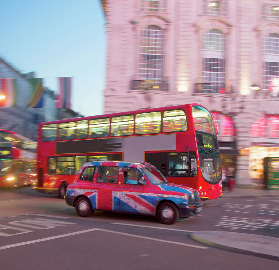 Piccadilly Circus, London Cab And Bus Photograph by Grant Faint