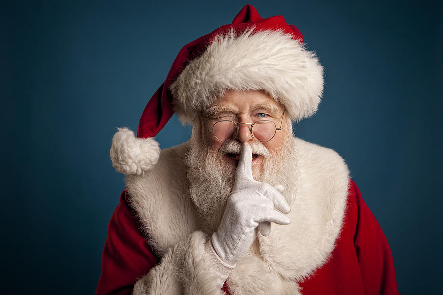 Pictures of Real Santa Claus with fingers on lips Photograph by Inhauscreative