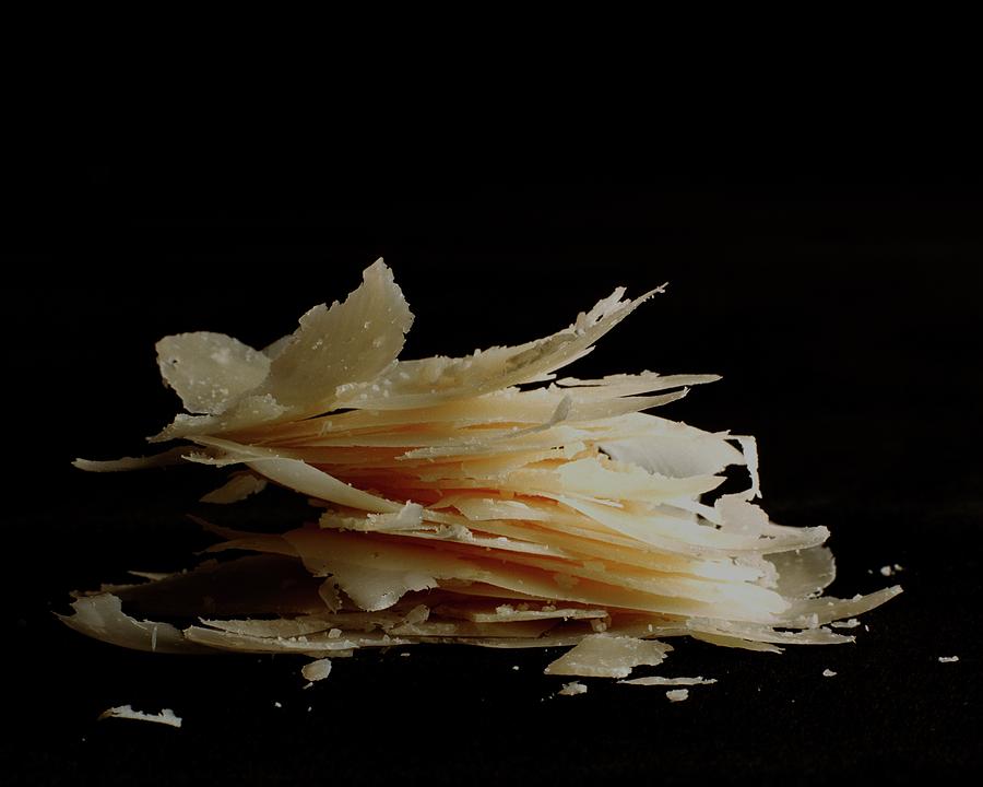 Pieces Of Parmesan Cheese Photograph by Romulo Yanes