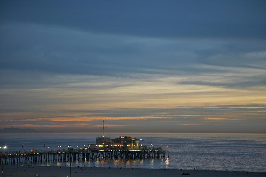 Pier, Ocean And Sky At Dusk Photograph by Barry Winiker