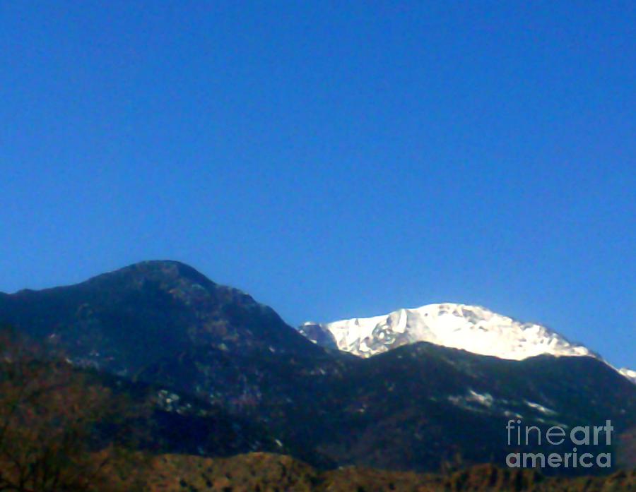 Pikes Peak Up Close and Covered With Snow Photograph by Kelly Awad