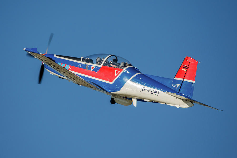 Pilatus Pc-9 Aircraft In Flight Photograph by Timm Ziegenthaler