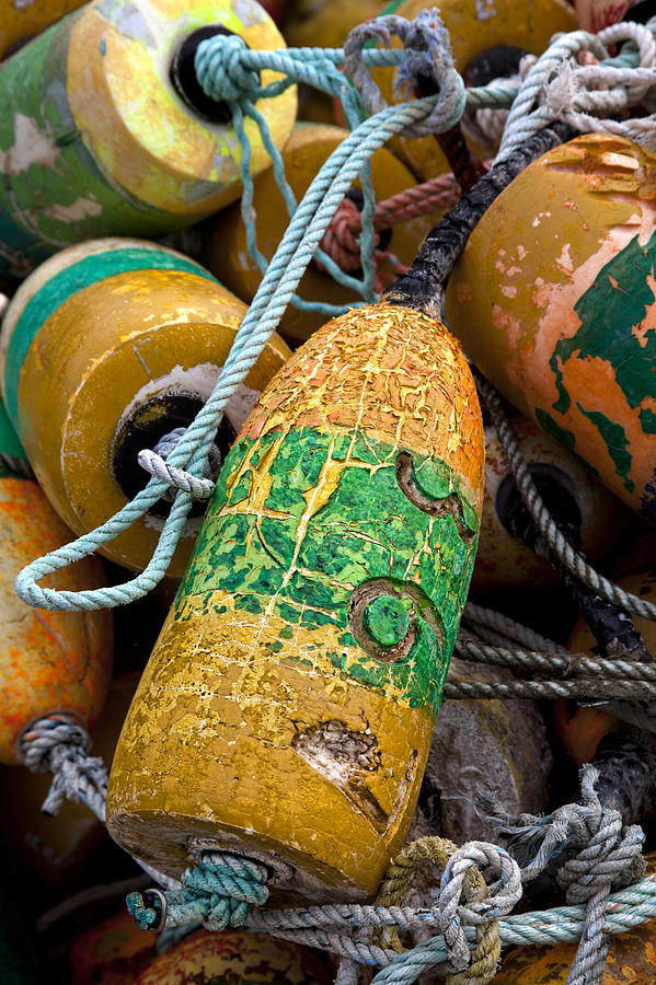 Pile of Colorful Buoys Photograph by Carol Leigh