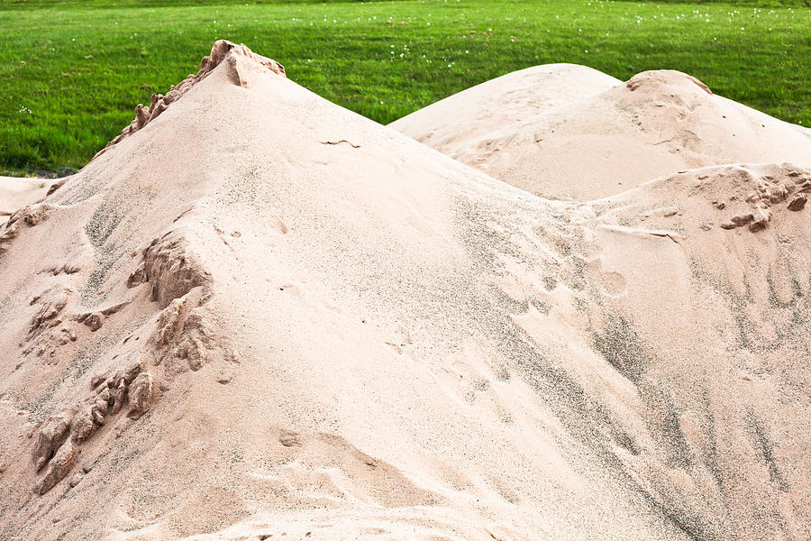 Golf Photograph - Pile of sand by Tom Gowanlock
