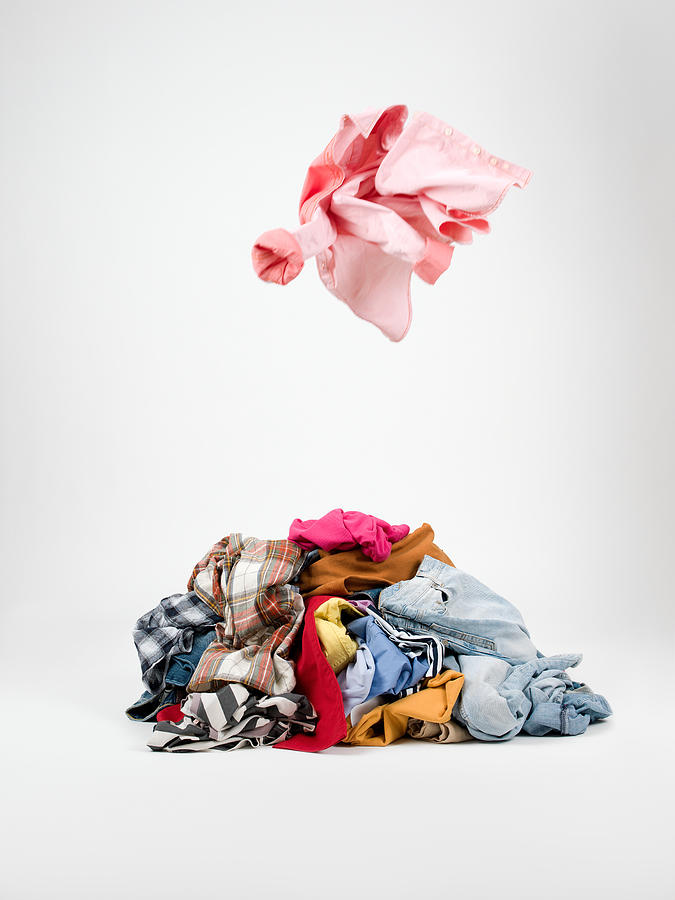 Piles of clothes Photograph by Ozgurdonmaz