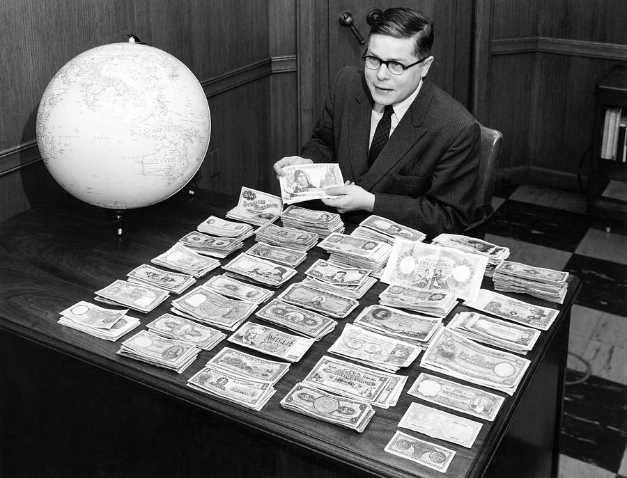 Cleveland Photograph - Piles Of Foreign Currency by Underwood Archives