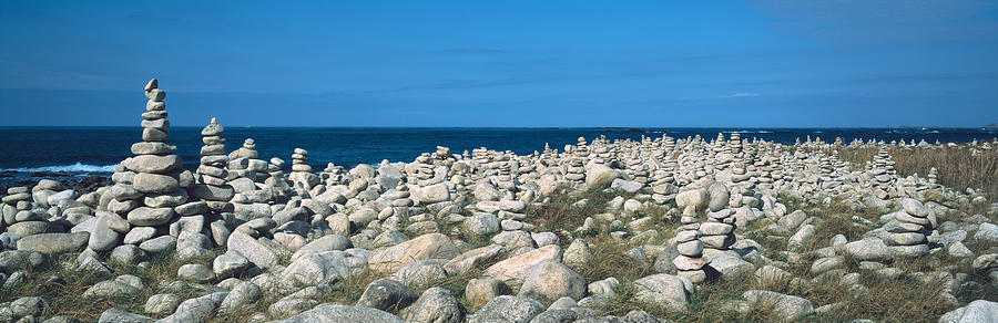 Nature Photograph - Piles Of Stones At The Coast by Panoramic Images