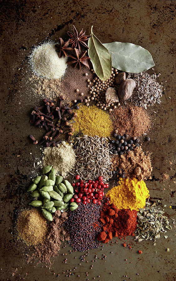 Piles Of Various Spices On Metal Surface Photograph by Maren Caruso
