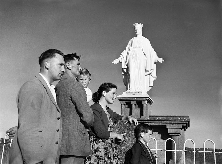 Black And White Photograph - Pilgrimage to Our Ladys Island 1954 by Irish Photo Archive