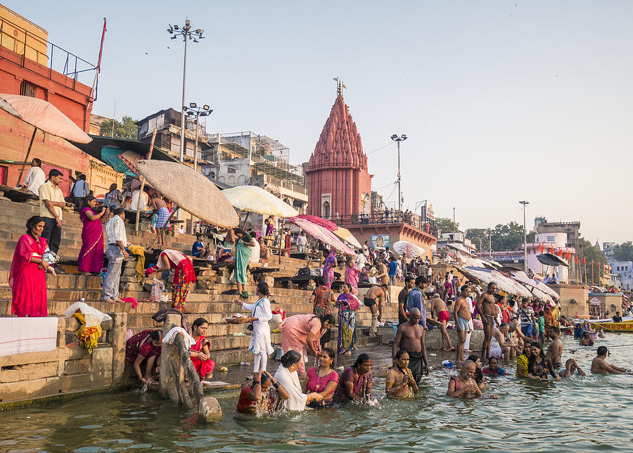 Pilgrims bathing in Dasaswamedh Ghat Varanasi Photograph by Aluxum