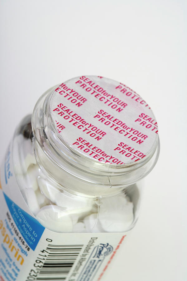 Pills And Pill Bottle Showing Safety Seal Photograph by Science Stock Photography/science Photo Library