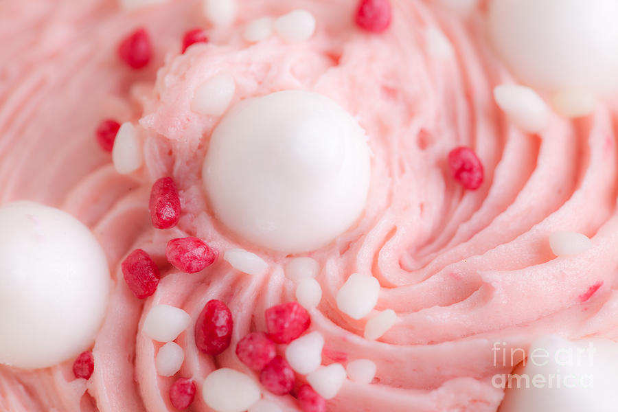 Pink cupcake decorated close up Photograph by Simon Bratt