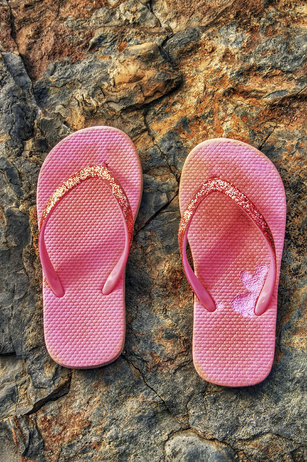 Pink Flip Flops on a Rock Photograph by Jason Politte