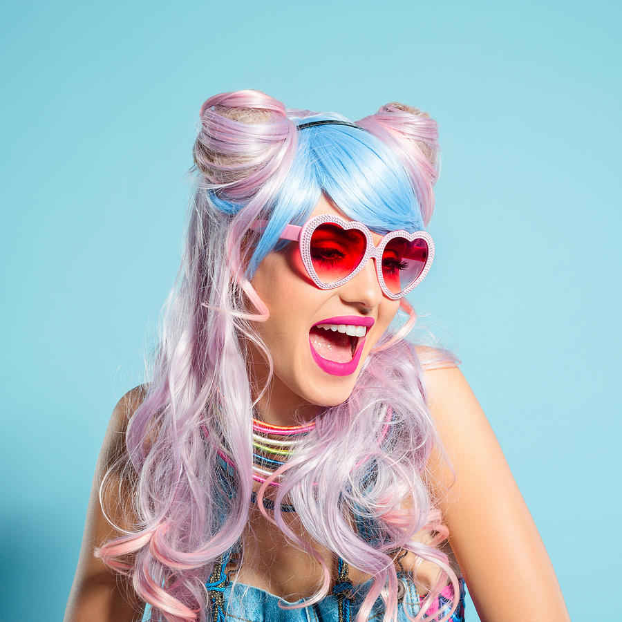 Pink hair girl in funky manga outfit wearing sunglasses Photograph by Izusek
