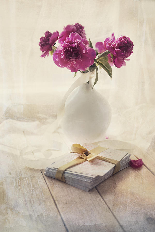 Flower Photograph - Pink peonies and pile of letters on the wooden table by Jaroslaw Blaminsky