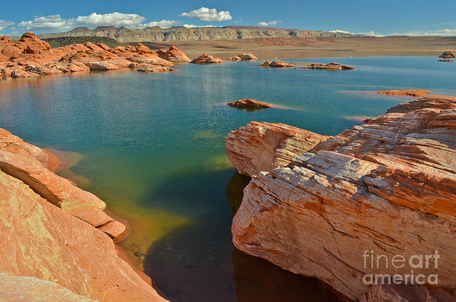 Pink rocks blue water by Jeff Loh Pink rocks blue water by Jeff Loh
