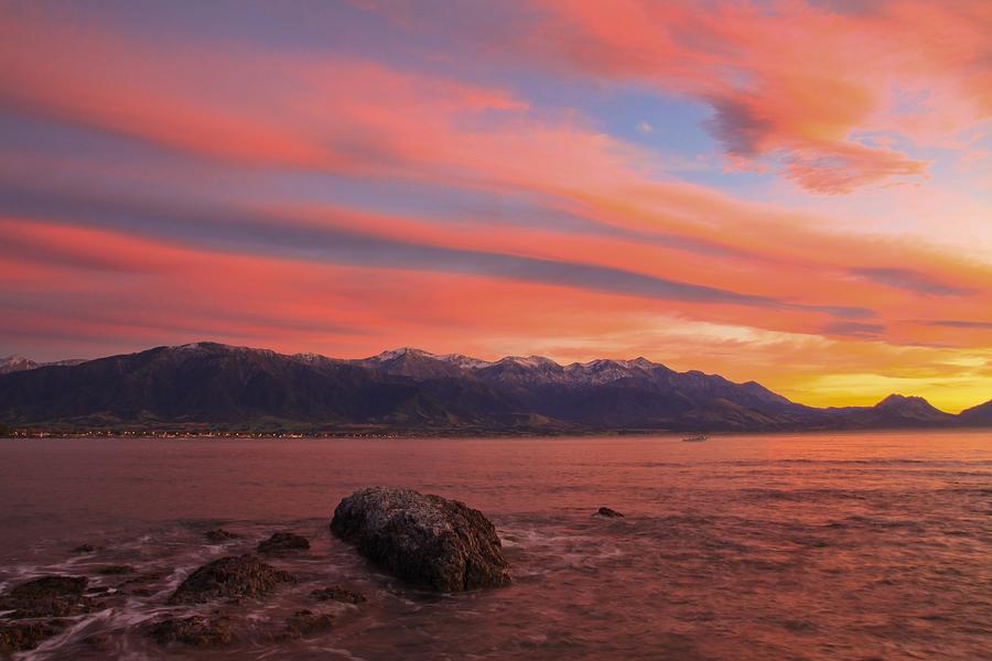 Pink sunrise over snow capped Kaikoura ranges Photograph by New Zealand Transition