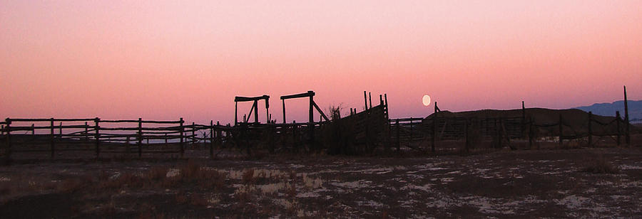 Pink sunset over corral Photograph by Cathy Anderson