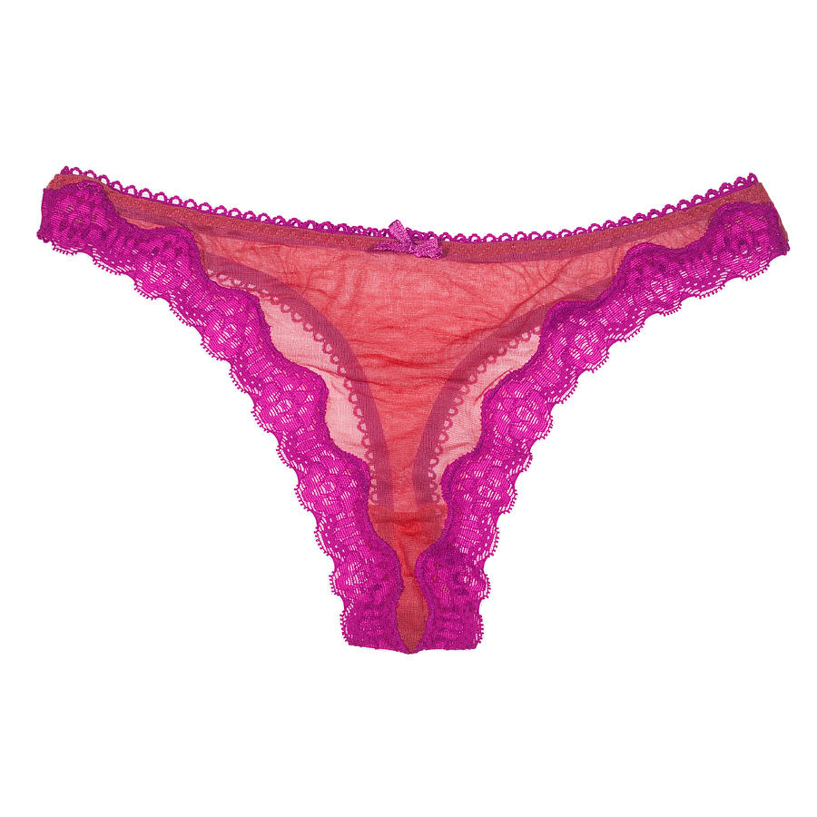 Pink thong panties on white background, front view. Photograph by Jaime Chard