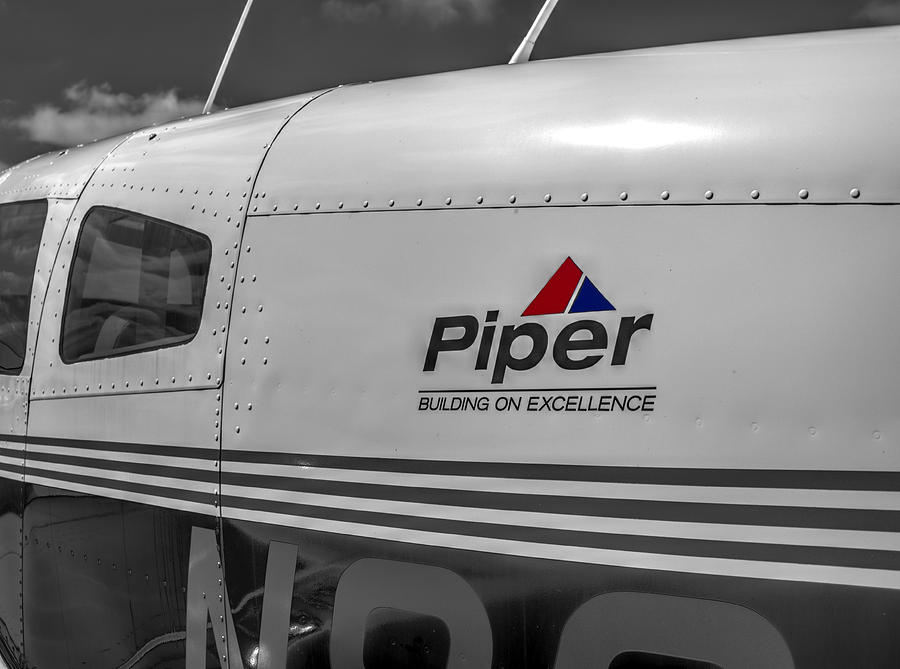 Vintage Photograph - Piper Aircraft Logo by John Straton