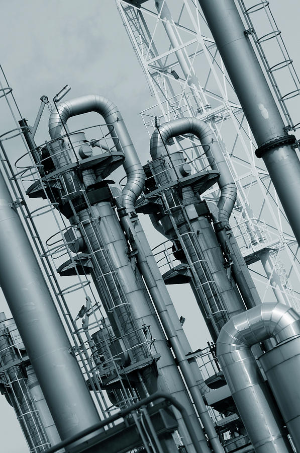 Pipes And Chimneys On An Oil And Gas Refinery Photograph by Christian Lagerek/science Photo Library